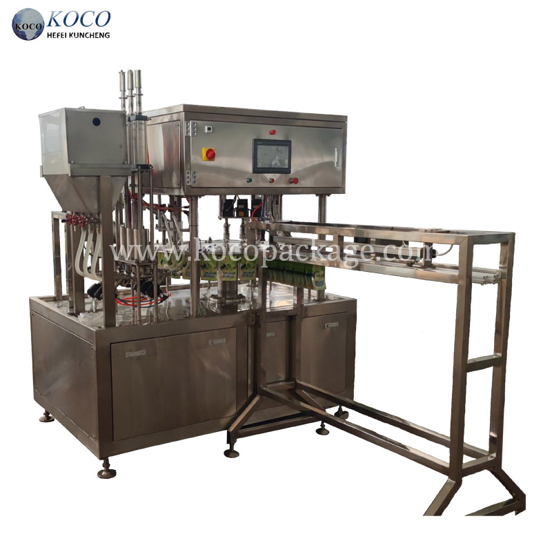 Stand-up juice pouch filling and capping machine